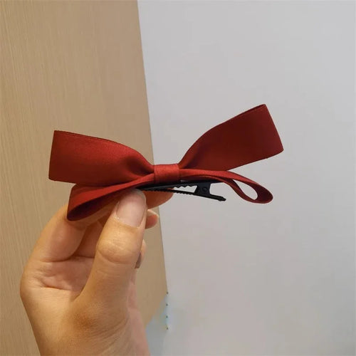 Fiocco per capelli con clip laterali