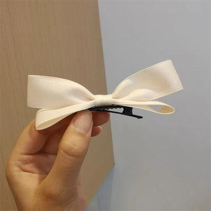 Fiocco per capelli con clip laterali